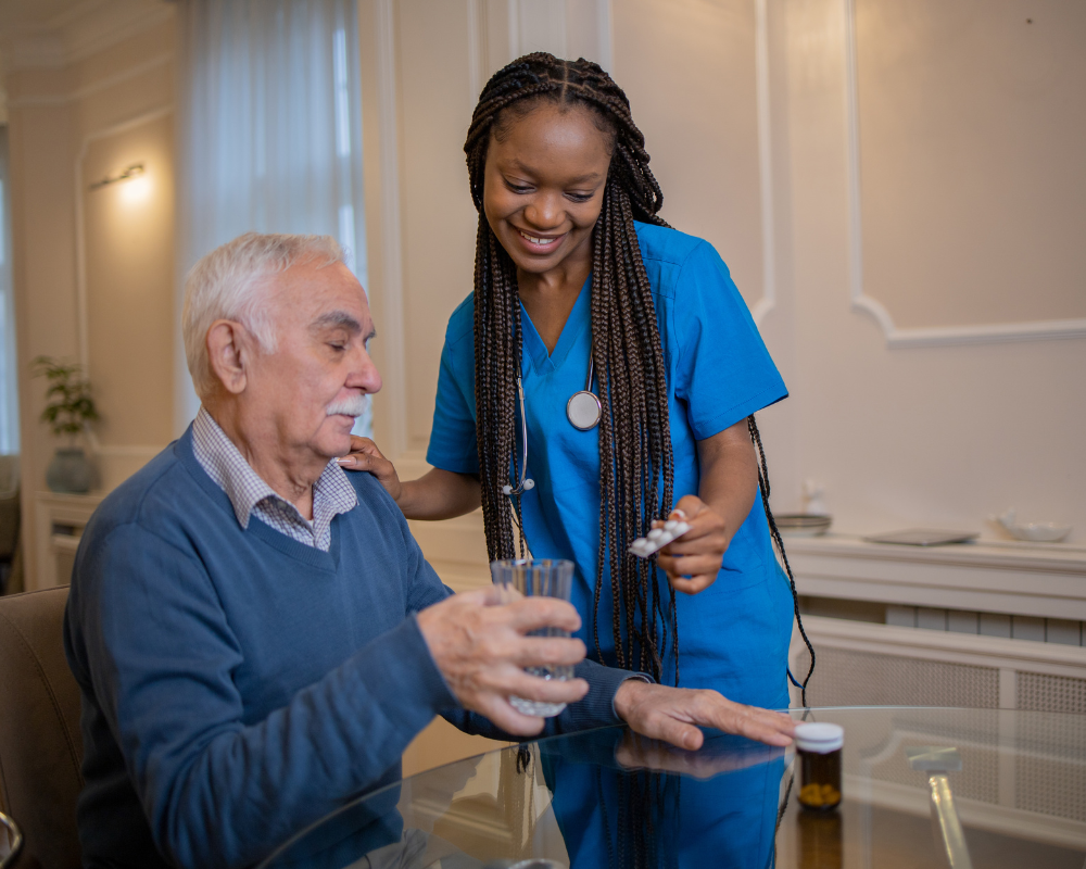 Caregiver playing cards with a client