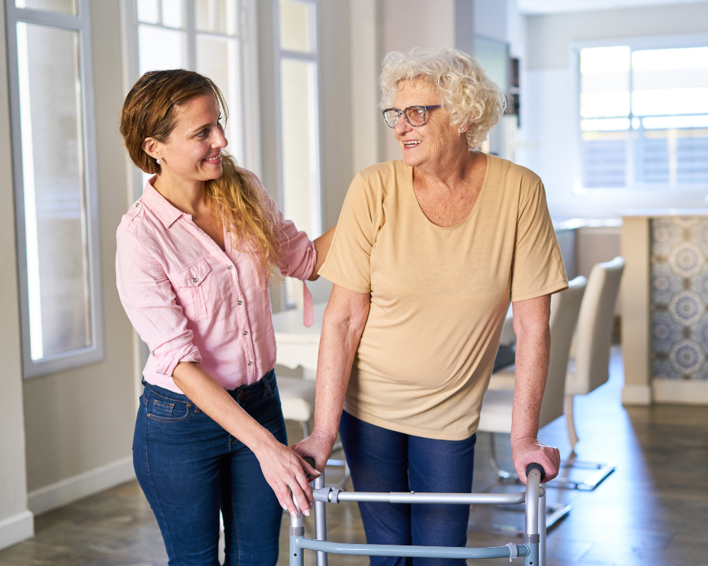Caregiver walking outdoors with a client in North Texas